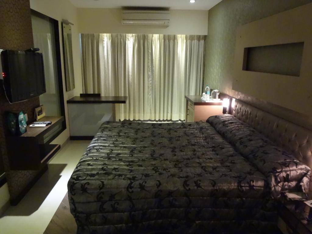 Hotel Capitol Тане Стая снимка